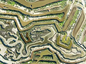 Directly: Saline ponds at the salt works of Isla Cristina