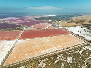 Industry: Saline ponds at the salt works of Walvis Bay Salt adjoining the Walvis Bay lagoon and the dunes of the Namib Desert