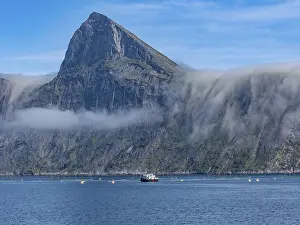 Chain: Salmon farm, aquaculture in the Mefjord on Senja