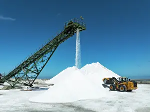 Industry: Salt heaps with conveyor belt and excavator at the Walvis Bay Salt works