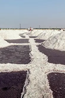Extraction: Salt heaps at salt mine at Sambhar Lake, Sambhar