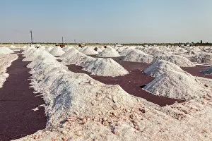 Extraction: Salt heaps at salt mine at Sambhar Lake, Sambhar