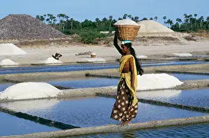Saltpans - female carrying salt basket