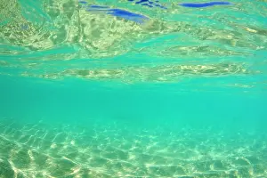 Rippled: Sand ripples and waves - underwater shot of a sun
