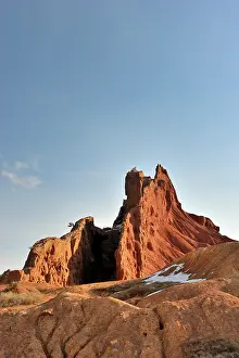Kyrgystan: Sandstone formation with snow in early morning light