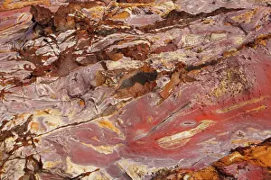 Manganese: Sandstone - pink with oxydation & minerals including