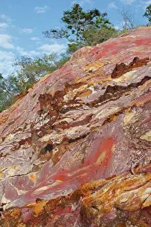 Manganese: Sandstone - pink with oxydation & minerals including