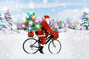 Bike: Santa Claus riding a bicycle through the snow with