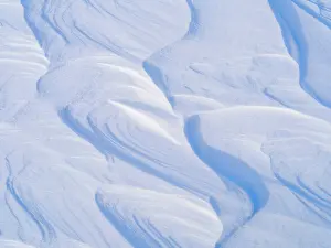 Abandoned: Sastrugi, wind erosion in snow, between glaciers Rabotbreen