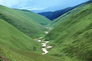 Tibet: Scenic, river running through valley at