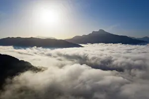 Protrude: Schafberg rising out of the sea of fog, inversion