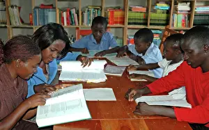 Books: School children reading books, Uganda, Africa