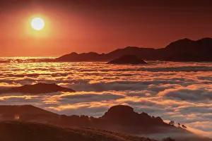Tops: Sea of clouds at daybreak, Orgambideska pass, Pyrenees-Atlan