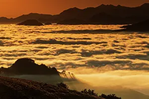 Tops: Sea of clouds at daybreak, Orgambideska pass, Pyrenees-Atlan