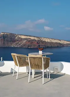 Table: Sea view from terrace with chairs and table, Ia