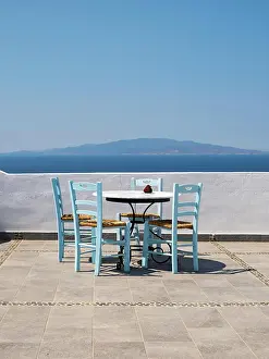 Table: Sea view from terrace with chairs and table, Ia