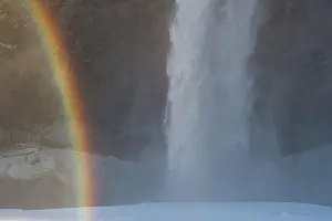 Falling: Seljalandfoss Waterfall (66m high) in winter