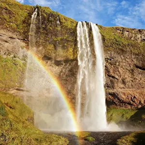 Prismatic: Seljalandsfoss waterfall with rainbow, Seljalandsa