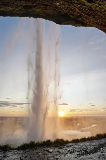 Spectacle: Seljalandsfoss waterfall at sunset, South Iceland, I
