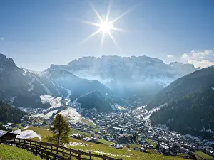 Larix: Sella mountain range and village Wolkenstein, Selva