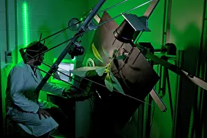 Rotation: Serge Douady using a Clinostat at night - A Clinostat