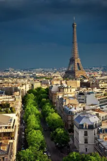 Rooftop: Setting sun illuminates the Eiffel Tower