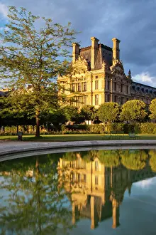 Jardin: Setting sunlight on Musee du Louvre and