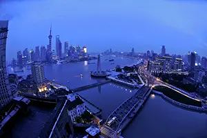 Pudong: Shanghai China - at dusk Huangpu River and oriental
