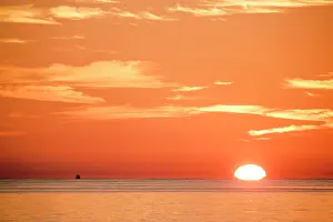 Sergio Arias: Ship in the sea at sunrise