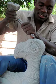 Sculptor: Shona Sculpture - sculptor working on sculpture