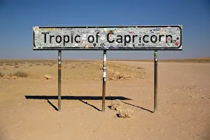 Riverbed: Sign Tropic of Capricorn, near Kuiseb Canyon, Erongo