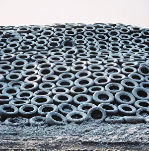 Recycling: Silage heap with snow-covered tires