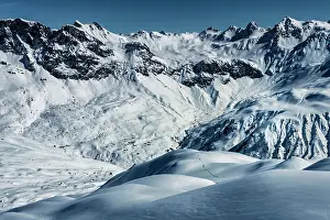 Incidental: Ski mountaineers in winter landscape with Vorarlberger