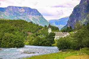Norwegian: Skjolden, Norway. Sognefjord, white steeple church in