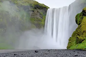 Humid: Skogafoss waterfall in spring with a long exposure