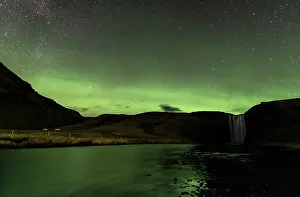 Skogafoss: Skogafoss Waterfalls at night with reflection of