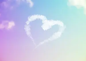 Writing: Sky Writing - heart written in the sky against clouds