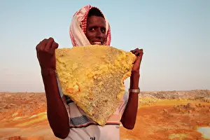Depression: Slab of salt coloured by sulphur, Dallol volcano