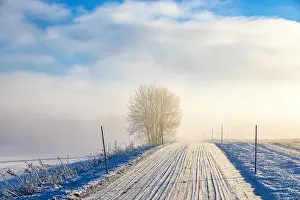 Swedish: Slippery winter country road with with snow and
