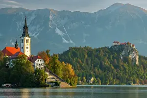 Church: Slovenia, Bled, Lake Bled. Town and island church reflect in