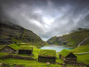 Made: Small houses near a blue lake, a small house made
