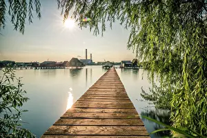 Jetty: Small wooden houses with a jetty in a lake, they