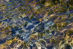 Smooth: Smooth river rocks beneath surface of small stream, Great