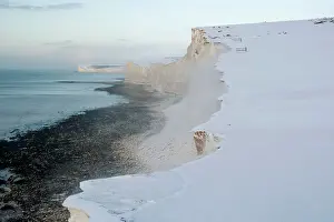Windswept: Snow blowing off the cliffs near the Seven Sisters