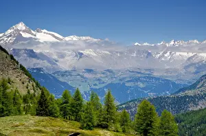 Canton: Snow-capped mountain and clouds and blue sky in