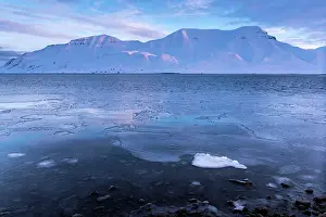 Longyearbyen: Snow Capped Mountains at dawn