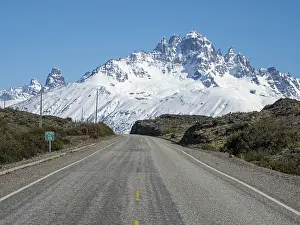 Chain: Snow-capped Mt. Cerro Castillo, rural road to Puerto