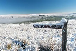 Direction: Snow covered footpath sign in Wensleydale, North