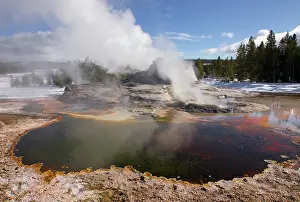 Geyser: Snow-covered landscape with geisher basin