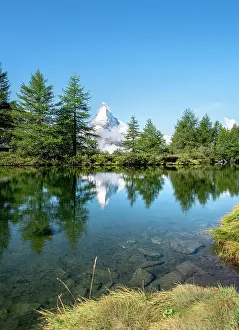 Zermatt: Snow-covered Matterhorn reflected in the lake, Lake
